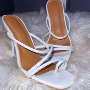 White strappy heels. Good/moderate condition. Comfortable. Square heel.